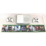 Xbox one console, controllers and games.