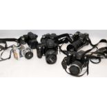 Collection of compact and DSLR digital cameras including Nikon and Fuji. Six in lot, all offered