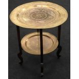 Mahogany oriental style folding side table with brass tray top and under shelf 59 cm tall 50cm