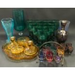 Collection of mixed coloured glassware.