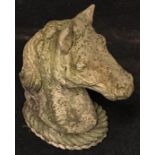 Garden statuary: A reconstituted concrete horse's head. 48cms tall