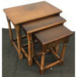 Nest of three mahogany side tables the largest measuring 54x59x39cm.