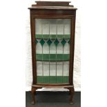 Edwardian mahogany bow fronted glazed display cabinet with decorative stained glass to front