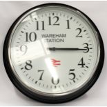 Large wall clock marked "Wareham Station" 60cm diameter.