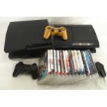 Four PS3 consoles controllers and games.