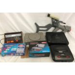 Various gaming consoles to include Sega Saturn, Sega Mega Drive II, Adman Grandstand and PlayStation