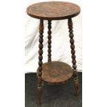 Vintage oak occasional/lamp table on three bobbin turned legs 76cm tall 38cm diameter.