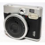Fujifilm Instax Mini 90 Neo Classic instant print camera. No charger so being sold untested but