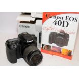 Canon D40 digital Slr camera c/w 18-55mm zoom lens. Comes in box with some ancillary items and 300