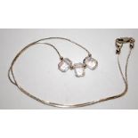 Crystal Fluid silver bead necklace.