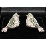 Quality pair of emerald and diamond encrusted sterling silver earrings in the form of birds