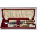 A three piece carving set in box.