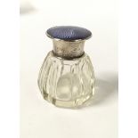 Silver and enamel topped Aspreys bottle.