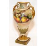 Antique Royal Worcester blush ivory pedestal vase with gilded accents featuring hand painted fruits.