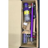 Dyson V10 hoover in box.