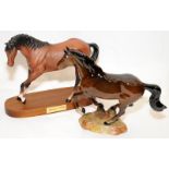 Two Beswick horse figures including 'Spirit of Youth' mounted on wooden plinth.