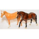 Beswick glossy horses, a chestnut and a Palomino, 16cms tall.