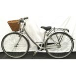 A Dawes Haarlem silver bicycle. Three gears. 16” frame size, 28” wheel size.