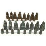 Full set of unusual plaster cast chess pieces. All pieces have chips to the plaster work. No board