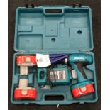 Makita Drill in case with batteries and chargers.