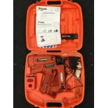 Paslode Impulse nail gun in case