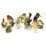 A collection of Beswick and Geobel ceramic bird figurines (9).
