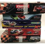 5 boxes of various racing car games to include Scalextric.
