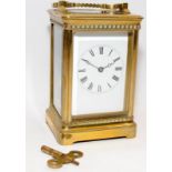 Quality antique 8 day striking carriage clock with porcelain dial and lever platform escapement.