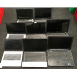 A collection of various laptops.