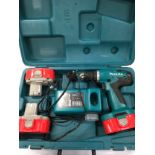 Makita Drill with 3 batteries and charger in case.