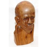 Large and heavy African art wooden carved male bust. 37cms tall