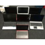 A collection of various laptops.