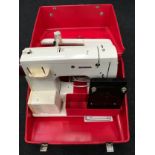 Bernina sewing machine in case with foot pedal.