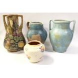 collection of three vintage pottery jugs together with a Poole Pottery traditional pattern vase (4).