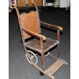 Antique adult wheelchair with bent wood frame