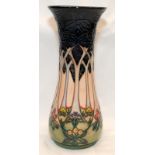 Large Moorcroft Pottery baluster vase in the Cluny pattern standing 31cms tall