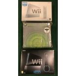 Collection of boxed game console systems to include Wii, Xbox 360 Elite and Wii Sports Resort