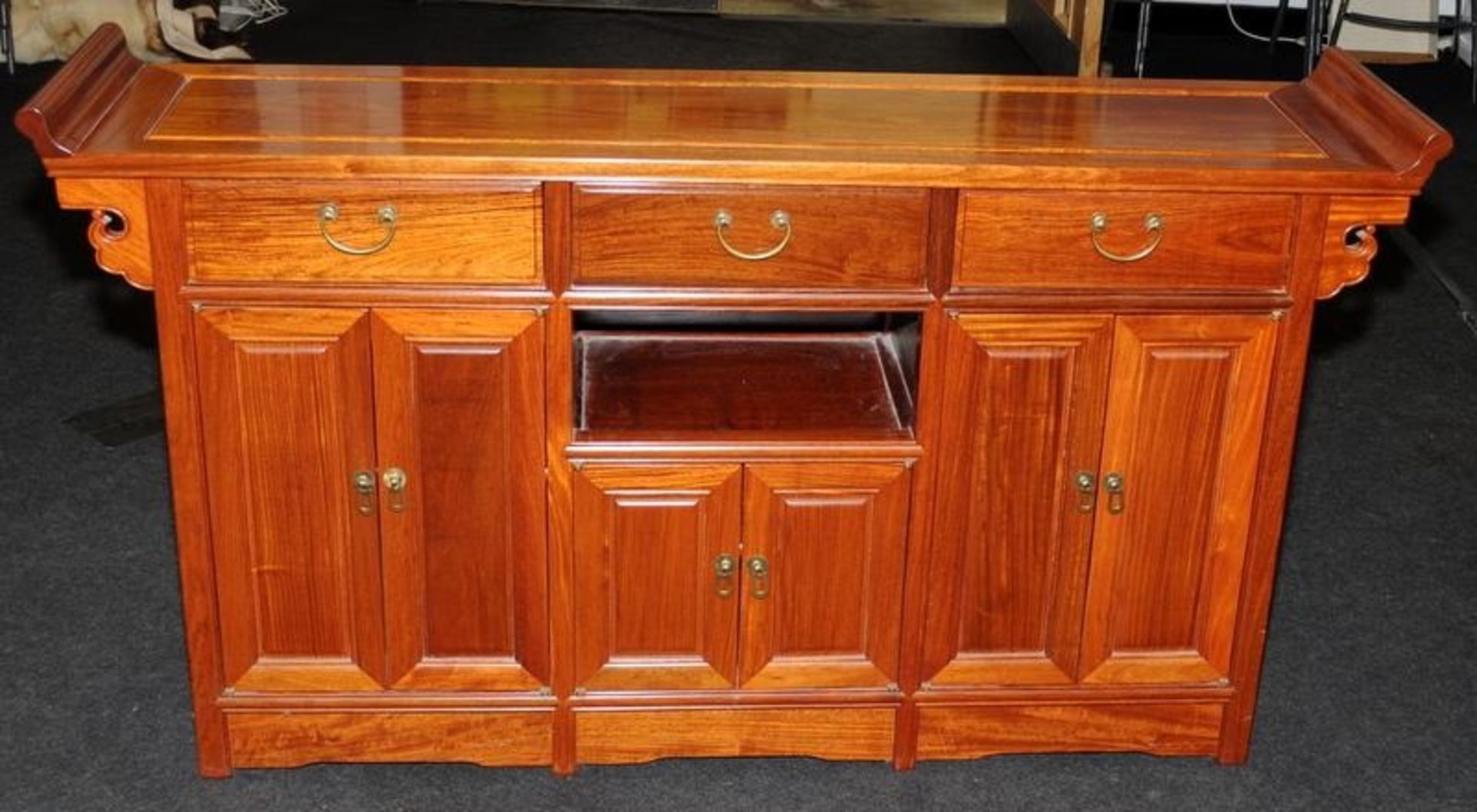 Chinese style hall table with three drawers over cupboards. 148cms wide x 81cms tall x 35cms deep