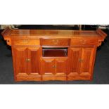 Chinese style hall table with three drawers over cupboards. 148cms wide x 81cms tall x 35cms deep