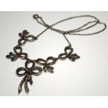 Antique Sterling silver marcasite bow necklace.