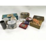 A collection of Royal commemorative tins etc.