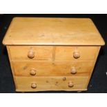 Victorian 2 over 2 chest of pine drawers on bun feet. 77cms tall x 84cms wide x 46cms deep