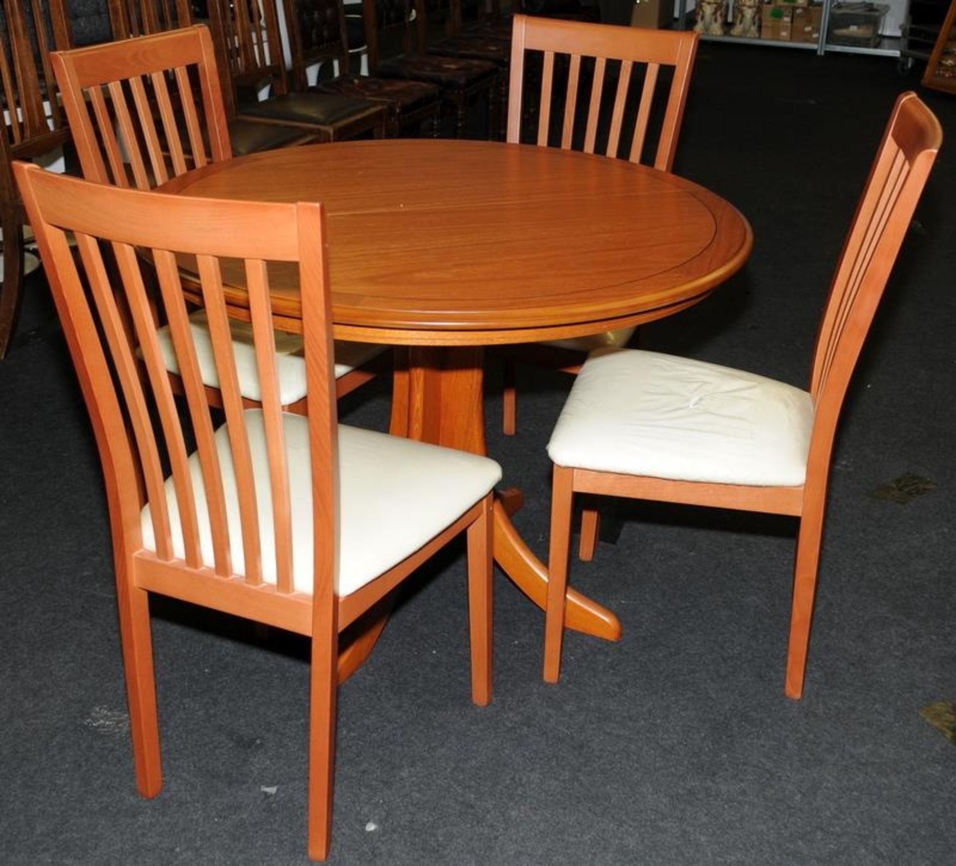 Circular extending table by Morris Furniture Co. c/w with four upholstered dining chairs. 140cms - Image 2 of 5