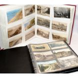 Two large postcard albums containing a large number of mostly local interest postcards including
