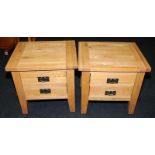 Pair of quality solid light oak bedside cabinets with single large drawer behind faux drawer fronts.