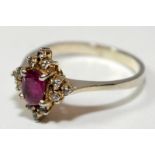 A Ruby/White Sapphire 925 silver cluster ring Size N 1/2.