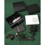 A box of various consoles incl. Xbox one PlayStations and for PlayStation controllers