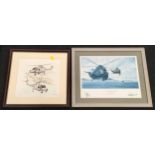 Two framed pictures depicting helicopters flying over Portland Naval Base.