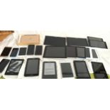 A large collection of tablets to include Ipads and Kindles.