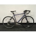 A purple racing bike 14 gears 20” frame size 28” wheel size. (35)